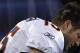 FOXBORO, MA - JANUARY 14: Tim Tebow #15 of the Denver Broncos kneels on the sideline in the second half against the New England Patriots during their AFC Divisional Playoff Game at Gillette Stadium on January 14, 2012 in Foxboro, Massachusetts. (Photo by Jim Rogash/Getty Images)