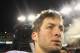 Tebow surrounded by the media and cameras after their loss to the Patriots Saturday night