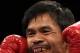 LAS VEGAS - NOVEMBER 14: Manny Pacquiao smiles before taking on Miguel Cotto during their WBO welterweight title fight at the MGM Grand Garden Arena on November 14, 2009 in Las Vegas, Nevada. (Photo by Al Bello/Getty Images)