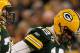 GREEN BAY, WI - JANUARY 15: Aaron Rodgers #12 of the Green Bay Packers looks on in the fourth quarter against the New York Giants during their NFC Divisional playoff game at Lambeau Field on January 15, 2012 in Green Bay, Wisconsin. (Photo by Jonathan Daniel/Getty Images)