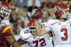 LOS ANGELES, CA - SEPTEMBER 10: Jordan Wynn #3 of the Utah Utes passes as he is rushed by Nick Perry #8 of the USC Trojans while blocked by John Cullen #77 of the Utah Utes during the game at Los Angeles Memorial Coliseum on September 10, 2011 in Los Angeles, California. (Photo by Harry How/Getty Images)