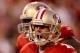 SAN FRANCISCO, CA - JANUARY 14: Alex Smith #11 of the San Francisco 49ers celebrates after running in for a touchdown in the fourth quarter of the NFC Divisional playoff game against the New Orleans Saints at Candlestick Park on January 14, 2012 in San Francisco, California. The 49ers won the game 36-32. (Photo by Ezra Shaw/Getty Images)