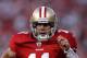 SAN FRANCISCO, CA - JANUARY 14: Alex Smith #11 of the San Francisco 49ers runs in for a touchdown in the fourth quarter against the New Orleans Saints during the NFC Divisional playoff game at Candlestick Park on January 14, 2012 in San Francisco, California. (Photo by Jed Jacobsohn/Getty Images)