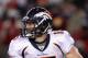 FOXBORO, MA - JANUARY 14: Tim Tebow #15 of the Denver Broncos looks to pass against the New England Patriots during their AFC Divisional Playoff Game at Gillette Stadium on January 14, 2012 in Foxboro, Massachusetts. (Photo by Elsa/Getty Images)