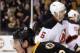 BOSTON, MA - NOVEMBER 15: Brad Marchand #63 of the Boston Bruins celebrates his goal against Johan Hedberg #1 of the New Jersey Devils on November 15, 2011 at TD Garden in Boston, Massachusetts. The Boston Bruins defeated the New Jersey Devils 4-3. (Photo by Elsa/Getty Images)