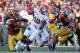 LOS ANGELES, CA - SEPTEMBER 10: DeVonte Christopher #10 of the Utah Utes turns away from Nickell Robey #21 of the USC Trojans at Los Angeles Memorial Coliseum on September 10, 2011 in Los Angeles, California. (Photo by Harry How/Getty Images)