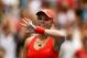 MELBOURNE, AUSTRALIA - JANUARY 18: Caroline Wozniacki of Denmark thanks the crowd after winning her second round match against Anna Tatishvili of Georgia during day three of the 2012 Australian Open at Melbourne Park on January 18, 2012 in Melbourne, Australia. (Photo by Scott Barbour/Getty Images)