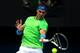 MELBOURNE, AUSTRALIA - JANUARY 20: Rafael Nadal of Spain plays a forehand in his third round match against Lukas Lacko of Slovakia during day five of the 2012 Australian Open at Melbourne Park on January 20, 2012 in Melbourne, Australia. (Photo by Cameron Spencer/Getty Images)