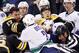BOSTON, MA - JANUARY 07: Milan Lucic #17 of the Boston Bruins fights with Kevin Bieksa #3 of the Vancouver Canucks in the first period on January 7, 2012 at TD Garden in Boston, Massachusetts. (Photo by Elsa/Getty Images)
