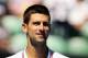 MELBOURNE, AUSTRALIA - JANUARY 19: Novak Djokovic of Serbia looks on in his second round match against Santiago Giraldo of Colombia during day four of the 2012 Australian Open at Melbourne Park on January 19, 2012 in Melbourne, Australia. (Photo by Scott Barbour/Getty Images)