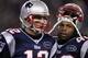 FOXBORO, MA - JANUARY 14: (L-R) Tom Brady #12 and BenJarvus Green-Ellis #42 of the New England Patriots look on against the Denver Broncos during their AFC Divisional Playoff Game at Gillette Stadium on January 14, 2012 in Foxboro, Massachusetts. (Photo by Elsa/Getty Images)