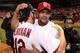ST LOUIS, MO - OCTOBER 28: Albert Pujols #5 (R) and Lance Berkman #12 of the St. Louis Cardinals celebrate after defeating the Texas Rangers 6-2 in Game Seven of the MLB World Series at Busch Stadium on October 28, 2011 in St Louis, Missouri. (Photo by Jamie Squire/Getty Images)