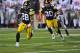IOWA CITY, IA - NOVEMBER 20: Defensive back Shaun Prater #28 of the University of Iowa Hawkeyes returns a pass interception against the Ohio State Buckeyes during the second half of play at Kinnick Stadium on November 20, 2010 in Iowa City, Iowa. Ohio State won 20-17 over Iowa. (Photo by David Purdy/Getty Images)