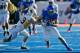 BOISE, ID - NOVEMBER 26: Tyler Shoemaker #89 of the Boise State Broncos runs the ball against Luke Ruff #29 of the Wyoming Cowboys at Bronco Stadium on November 26, 2011 in Boise, Idaho. (Photo by Otto Kitsinger III/Getty Images)
