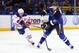 ST. LOUIS, MO - JANUARY 19: Patrik Berglund #21 of the St. Louis Blues takes a shot on goal against Shawn Horcoff #10 of the Edmonton Oilers at the Scottrade Center on January 19, 2012 in St. Louis, Missouri. (Photo by Dilip Vishwanat/Getty Images)