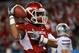 ARLINGTON, TX - JANUARY 06: Jarius Wright #4 of the Arkansas Razorbacks celebrates a touchdown pass reception against the Kansas State Wildcats during the Cotton Bowl at Cowboys Stadium on January 6, 2012 in Arlington, Texas. (Photo by Ronald Martinez/Getty Images)