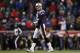 FOXBORO, MA - JANUARY 14: Tom Brady #12 of the New England Patriots walks back to the sideline against the Denver Broncos during their AFC Divisional Playoff Game at Gillette Stadium on January 14, 2012 in Foxboro, Massachusetts. (Photo by Al Bello/Getty Images)