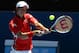 Kei Nishikori ended Jo-Wilfried Tsonga's campaign for his first Grand Slam, winning in the fifth set to move onto his first Slam quarterfinal.