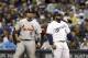 MILWAUKEE, WI - OCTOBER 16: (L-R) Albert Pujols #5 of the St. Louis Cardinals and Prince Fielder #28 of the Milwaukee Brewers look on during Game Six of the National League Championship Series at Miller Park on October 16, 2011 in Milwaukee, Wisconsin. (Photo by Christian Petersen/Getty Images)