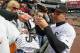 CHICAGO, IL - SEPTEMBER 28: Omar Vizquel #11 of the Chicago White Sox signs autographs before the final game of the 2011 season against the Toronto Blue Jays at U.S. Cellular Field on September 28, 2011 in Chicago, Illinois. (Photo by Jonathan Daniel/Getty Images)