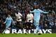 MANCHESTER, ENGLAND - JANUARY 22: Mario Balotelli of Manchester City celebrates scoring his team's third goal from a penalty during the Barclays Premier League match between Manchester City and Tottenham Hotspur at the Etihad Stadium on January 22, 2012 in Manchester, England. (Photo by Alex Livesey/Getty Images)