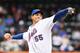NEW YORK, NY - APRIL 10: Chris Young #55 of the New York Mets pitches against the Washington Nationals during their game on April 10, 2011 at Citi Field in the Flushing neighborhood of the Queens borough of New York City. (Photo by Al Bello/Getty Images)