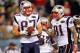 PHILADELPHIA, PA - NOVEMBER 27: (L-R) Rob Gronkowski #87 and Aaron Hernandez #81 of the New England Patriots react after Gronkowski caught a 24-yard touchdown reception in the fourth quarter against the Philadelphia Eagles at Lincoln Financial Field on November 27, 2011 in Philadelphia, Pennsylvania. (Photo by Rich Schultz/Getty Images)