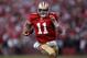 SAN FRANCISCO, CA - JANUARY 14: Alex Smith #11 of the San Francisco 49ers runs in for a touchdown in the fourth quarter against the New Orleans Saints during the NFC Divisional playoff game at Candlestick Park on January 14, 2012 in San Francisco, California. (Photo by Jed Jacobsohn/Getty Images)