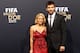 ZURICH, SWITZERLAND - JANUARY 09: Gerard Pique of Barcelona with Shakira during the red carpet arrivals for the FIFA Ballon d'Or Gala 2011 on January 9, 2012 in Zurich, Switzerland. (Photo by Scott Heavey/Getty Images)