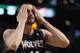 BOSTON, MA - JANUARY 03: Kevin Love #42 of the Minnesota Timberwolves wipes his face in the fourth quarter against the Boston Celtics on January 3, 2011 at the TD Garden in Boston, Massachusetts. The Celtics defeated the Timberwolves 96-93. NOTE TO USER: User expressly acknowledges and agrees that, by downloading and/or using this Photograph, User is consenting to the terms and conditions of the Getty Images License Agreement. (Photo by Elsa/Getty Images)