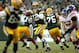 GREEN BAY, WI - JANUARY 15: Aaron Rodgers #12 of the Green Bay Packers looks to pass against the New York Giants during their NFC Divisional playoff game at Lambeau Field on January 15, 2012 in Green Bay, Wisconsin. (Photo by Jamie Squire/Getty Images)