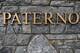 STATE COLLEGE, PA - JANUARY 22: A rosary necklace hangs from the name on the wall at the statue of Joe Paterno, the former Penn State football coach, outside of Beaver Stadium on January 22, 2012 in State College, Pennsylvania. Paterno, who was 85 years old, died due to complications from lung cancer. (Photo by Patrick Smith/Getty Images)