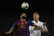 BARCELONA, SPAIN - JANUARY 25: Dani Alves of FC Barcelona (L) duels for a high ball with Cristiano Ronaldo of Real Madrid during the Copa del Rey quarter final second leg match between FC Barcelona and Real Madrid at Camp Nou on January 25, 2012 in Barcelona, Spain. (Photo by David Ramos/Getty Images)