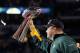 ARLINGTON, TX - FEBRUARY 06: Head coach Mike McCarthy of the Green Bay Packers holds up the Vince Lombardi Trophy after winning Super Bowl XLV 31-25 against the Pittsburgh Steelers at Cowboys Stadium on February 6, 2011 in Arlington, Texas. (Photo by Kevin C. Cox/Getty Images)