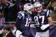 FOXBORO, MA - JANUARY 14: (L-R) Tom Brady #12 and Rob Gronkowski #87 of the New England Patriots celebrate after Gronkowski caught a 10-yard touchdown reception from Brady in the first quarter against the Denver Broncos during their AFC Divisional Playoff Game at Gillette Stadium on January 14, 2012 in Foxboro, Massachusetts. (Photo by Elsa/Getty Images)