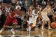 HARTFORD, CT - DECEMBER 3: Ryan Boatright #11 of the Connecticut Huskies chases a loose ball against Julysses Nobles #23 of the Arkansas Razorbacks in the first half on December 3, 2011 at the XL Center in Hartford, Connecticut. (Photo by Jim Rogash/Getty Images)