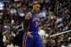 WASHINGTON, DC - JANUARY 06: Carmelo Anthony #7 of the New York Knicks reacts after making a basket during the second half against the Washington Wizards at Verizon Center on January 6, 2012 in Washington, DC. NOTE TO USER: User expressly acknowledges and agrees that, by downloading and or using this photograph, User is consenting to the terms and conditions of the Getty Images License Agreement. (Photo by Rob Carr/Getty Images)
