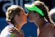 MELBOURNE, AUSTRALIA - JANUARY 26: Victoria Azarenka of Belarus and Kim Clijsters of Belgium embrace at the net after their semifinal match during day eleven of the 2012 Australian Open at Melbourne Park on January 26, 2012 in Melbourne, Australia. (Photo by Clive Brunskill/Getty Images)