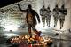 STATE COLLEGE, PA - JANUARY 22: Candles, many burnt out, circle the statue of Joe Paterno, the former Penn State football coach, outside of Beaver Stadium in the early hours of January 22, 2012 in State College, Pennsylvania. The community was reacting to news that Joe Paterno, who is suffering from lung cancer and who was fired in November in the aftermath of child sex abuse charges against a former assistant, was in serious condition. (Photo by Patrick Smith/Getty Images)