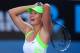 MELBOURNE, AUSTRALIA - JANUARY 26: Maria Sharapova of Russia celebrates winning match point in her semifinal match against Petra Kvitova of the Czech Republic during day eleven of the 2012 Australian Open at Melbourne Park on January 26, 2012 in Melbourne, Australia. (Photo by Cameron Spencer/Getty Images)