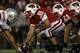 MADISON, WI - OCTOBER 16: Peter Konz #66 of the Wisconsin Badgers prepares to snap the ball to Scott Tolzien #16 against the Ohio State Buckeyes at Camp Randall Stadium on October 16, 2010 in Madison, Wisconsin. Wisconsin defeated Ohio State 31-18. (Photo by Jonathan Daniel/Getty Images)