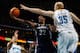 NEW ORLEANS, LA - JANUARY 18: O.J. Mayo #32 of the Memphis Grizzlies shoots the ball around Chris Kaman #35 of the New Orleans Hornets at New Orleans Arena on January 18, 2012 in New Orleans, Louisiana. NOTE TO USER: User expressly acknowledges and agrees that, by downloading and or using this photograph, User is consenting to the terms and conditions of the Getty Images License Agreement. (Photo by Chris Graythen/Getty Images)