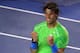 MELBOURNE, AUSTRALIA - JANUARY 26: Rafael Nadal of Spain celebrates winning his semifinal match against Roger Federer of Switzerland during day eleven of the 2012 Australian Open at Melbourne Park on January 26, 2012 in Melbourne, Australia. (Photo by Scott Barbour/Getty Images)