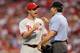 ST LOUIS, MO - OCTOBER 05: Roy Oswalt #44 of the Philadelphia Phillies talks with home plate umpire Angel Hernandez after a squirrel ran across home in the fifth inning against the St. Louis Cardinals in Game Four of the National League Division Series at Busch Stadium on October 5, 2011 in St Louis, Missouri. (Photo by Jamie Squire/Getty Images)