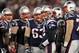 FOXBORO, MA - JANUARY 22: Tom Brady #12 of the New England Patriots looks on with teammates against the Baltimore Ravens during their AFC Championship Game at Gillette Stadium on January 22, 2012 in Foxboro, Massachusetts. (Photo by Jim Rogash/Getty Images)