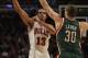 CHICAGO, IL - JANUARY 27: Joakim Noah #13 of the Chicago Bulls passes the ball over Jon Leuer #30 of the Milwaukee Bucks at the United Center on January 27, 2012 in Chicago, Illinois. The Bulls defeated the Bucks 107-100. NOTE TO USER: User expressly acknowledges and agrees that, by downloading and or using this photograph, User is consenting to the terms and conditions of the Getty Images License Agreement. (Photo by Jonathan Daniel/Getty Images)