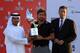 ABU DHABI, UNITED ARAB EMIRATES - JANUARY 29: Robert Rock of England with Sheikh Sultan Bin Tahnoon Al Nahyan the Chairman of the Abu Dhabi Tourism Authority (l) and Simon Cooper Deputy Chairman and Chief Executive Officer of HSBC Middle East & North Africa (r) after after the final round of the Abu Dhabi HSBC Championship at the Abu Dhabi Golf Club on January 29, 2012 in Abu Dhabi, United Arab Emirates. (Photo by David Cannon/Getty Images)