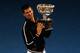 MELBOURNE, AUSTRALIA - JANUARY 29: Novak Djokovic of Serbia poses with the Norman Brookes Challenge Cup after winning the men's final match against Rafael Nadal of Spain during day fourteen of the 2012 Australian Open at Melbourne Park on January 29, 2012 in Melbourne, Australia. (Photo by Mark Dadswell/Getty Images)