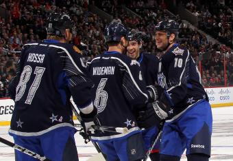 Gaborik celebrates a goal with teammates