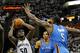 MEMPHIS, TN - MAY 13: Zach Randolph #50 of the Memphis Grizzlies shoots against Kendrick Perkins #5 of the Oklahoma City Thunder in Game Six of the Western Conference Semifinals in the 2011 NBA Playoffs at FedExForum on May 13, 2011 in Memphis, Tennessee. NOTE TO USER: User expressly acknowledges and agrees that, by downloading and/or using this photograph, User is consenting to the terms and conditions of the Getty Images License Agreement. (Photo by Kevin C. Cox/Getty Images)